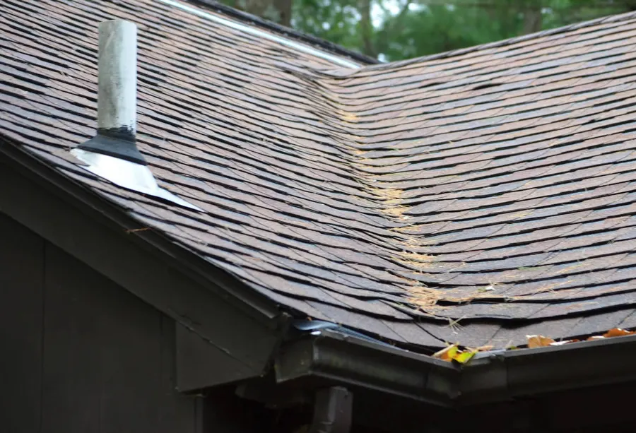 Finished roof replacement with new gutters and trim